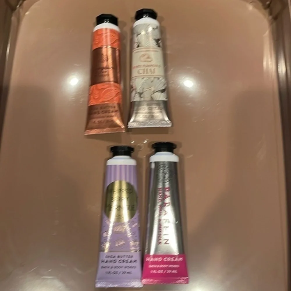 Lot of 4 bath and body works hand cream